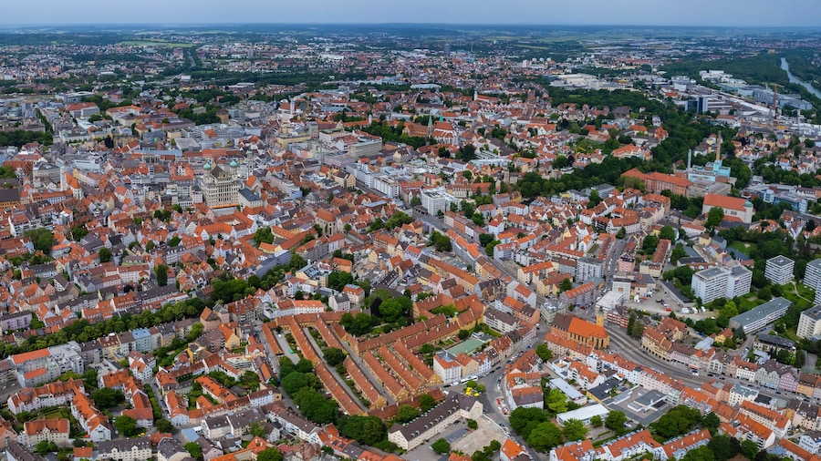 Aerial panorama view of the old town and city Augsburg in Germany, Bavaria on a sunny noon spring day