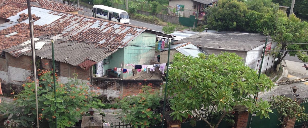 Overlooking a neighborhood outside of San Salvador from the top story of a primary school.