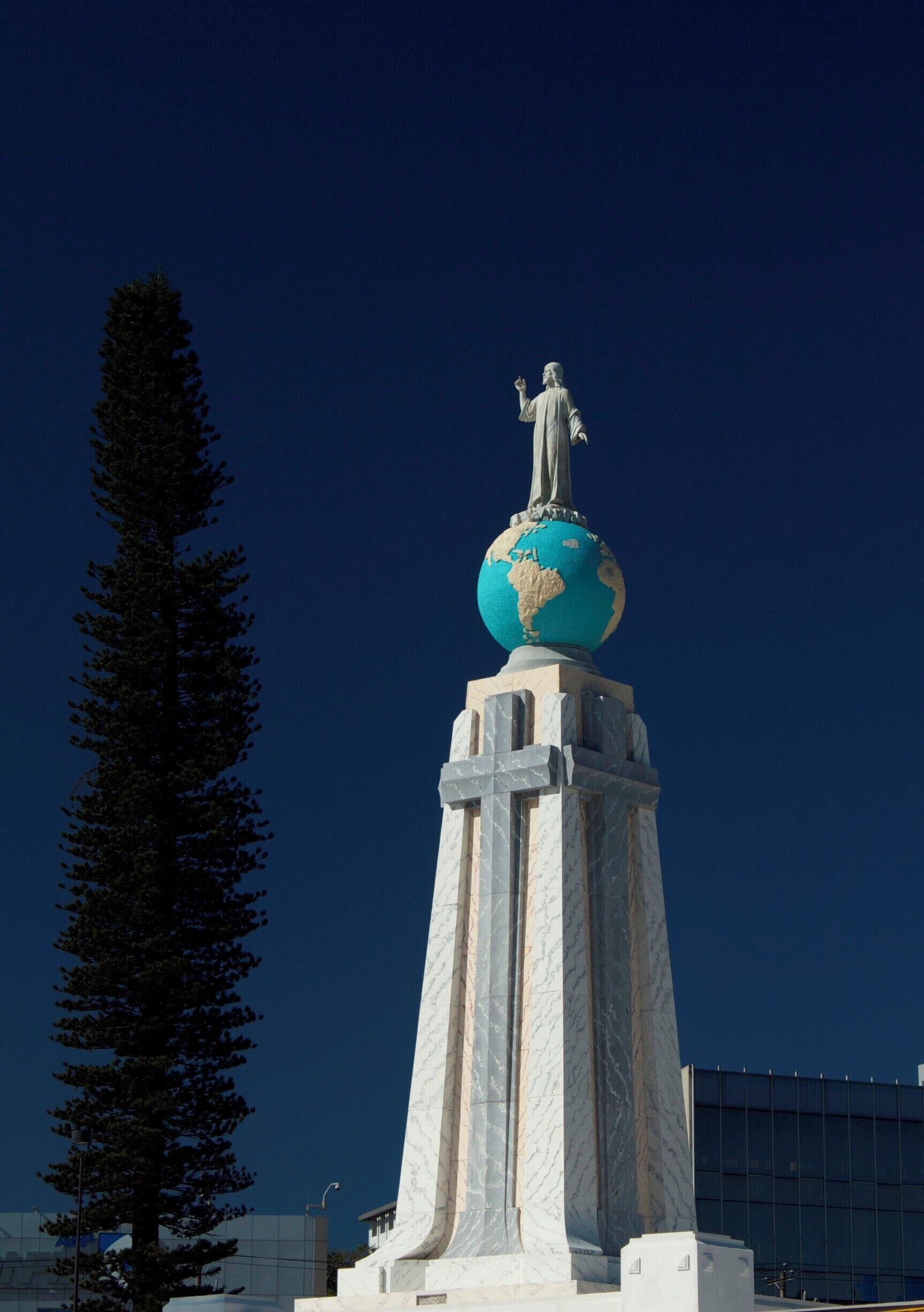 I have visited El Salvador many times. This monument was originally used to decorate the tomb of Manuel Enrique Araujo, the President of El Salvador between 1911 and 1913, and presented by Araujo's family on November 26, 1942, in connection to the first National Eucharistic Congress in San Salvador. The iconic statue of Christ on the globe sphere of planet earth is part of the Monument to Divino Salvador del Mundo on Plaza El Salvador del Mundo (The Savior of the World Plaza).