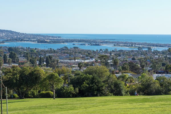 Small park with great views of San Diego, the skyline, Mission Bay and and the Pacific Ocean. The park is mainly visit by local people with their dogs as we can run free on the large grass area. It’s also nice for just Picknick and watching the views. RV parking was plenty along the curbside inside the park but probably hard to use the turn-back circle on the end of the park for RVs over 30 feet long. More photos from here can you find on my blog:
https://rv-fox.com/places-to-visit-by-rv/kate-sessions-park/