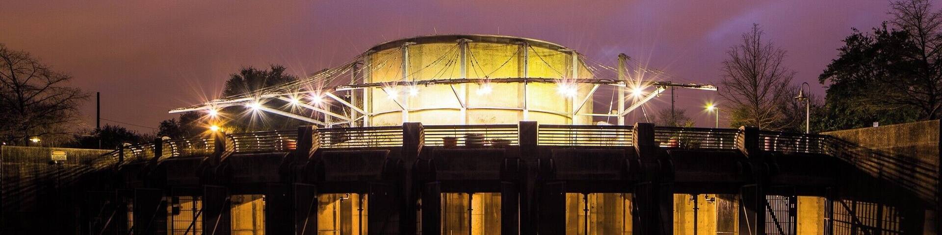 There are two large tunnels running beneath San Antonio to control floods and maintain flow in the San Antonio River during times of inadequate water availability. At each tunnel endpoint there is a large modern-looking structure that is fun to view and photograph. Nearby Roosevelt Park and the old Lone Star Brewery are also enjoyable views.