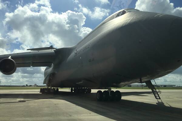 Holy! This thing is cargo plane is massive! It weighs 350,000 lbs empty!