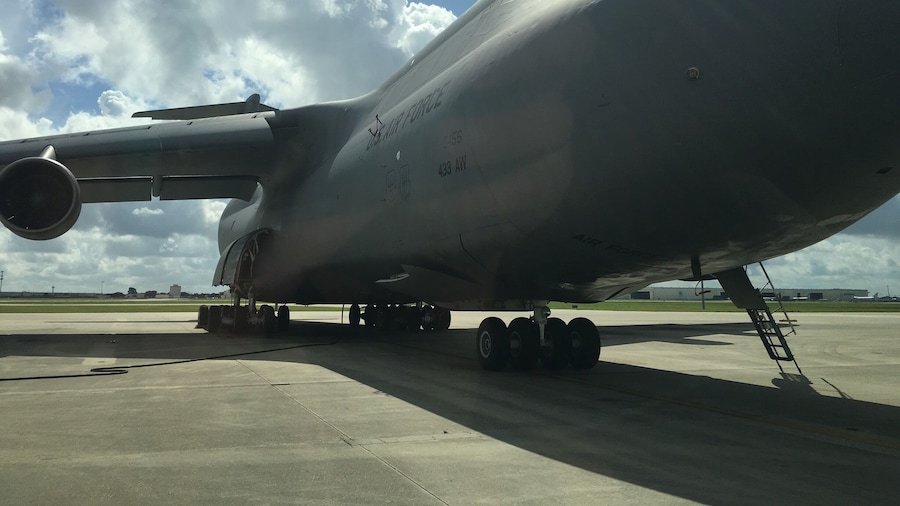 Holy! This thing is cargo plane is massive! It weighs 350,000 lbs empty!