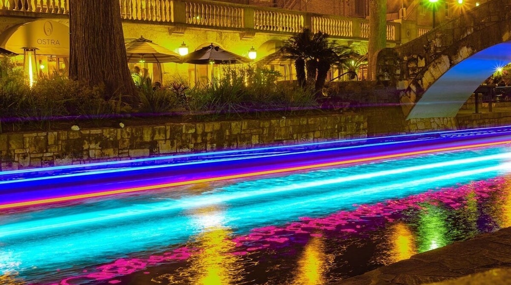 Long Exposure Photography on the San Antonio River Walk. Sight seeing boats near the Selena Bridge.