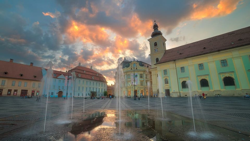 Sibiu used to be the Capital of Transylvania. It was called Hermannstadt in the middle ages and was built by the Saxons. You can clearly see it's Germanic influence in the architecture.
http://www.alwayswanderlust.com/a-guide-to-seven-cool-and-not-so-cool-cities-in-romania-where-is-romania/