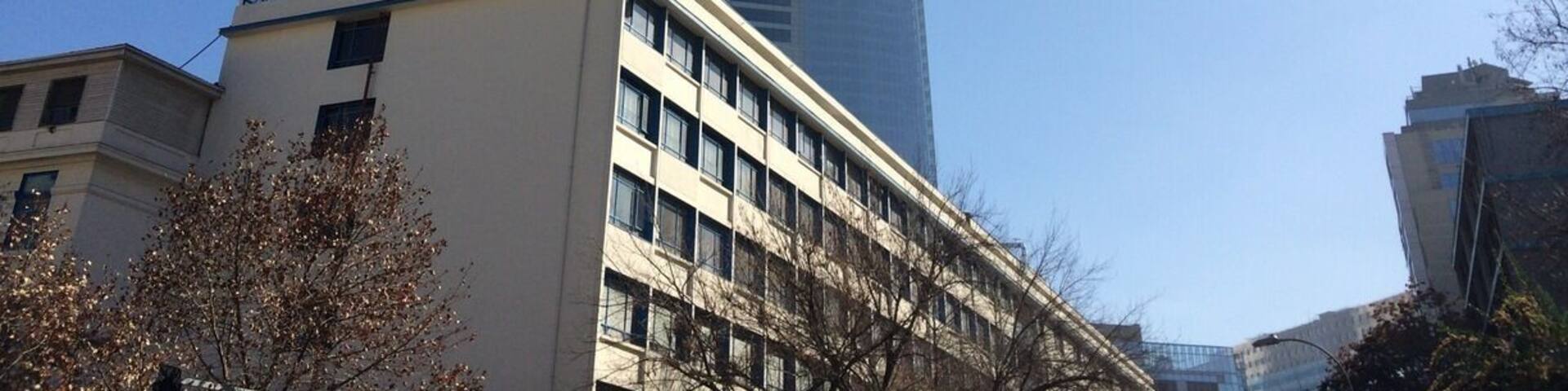 A bit too smoggy for a great shot but it is indeed the tallest building in chile.