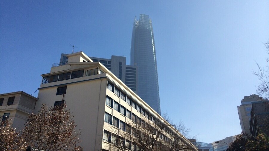 A bit too smoggy for a great shot but it is indeed the tallest building in chile.