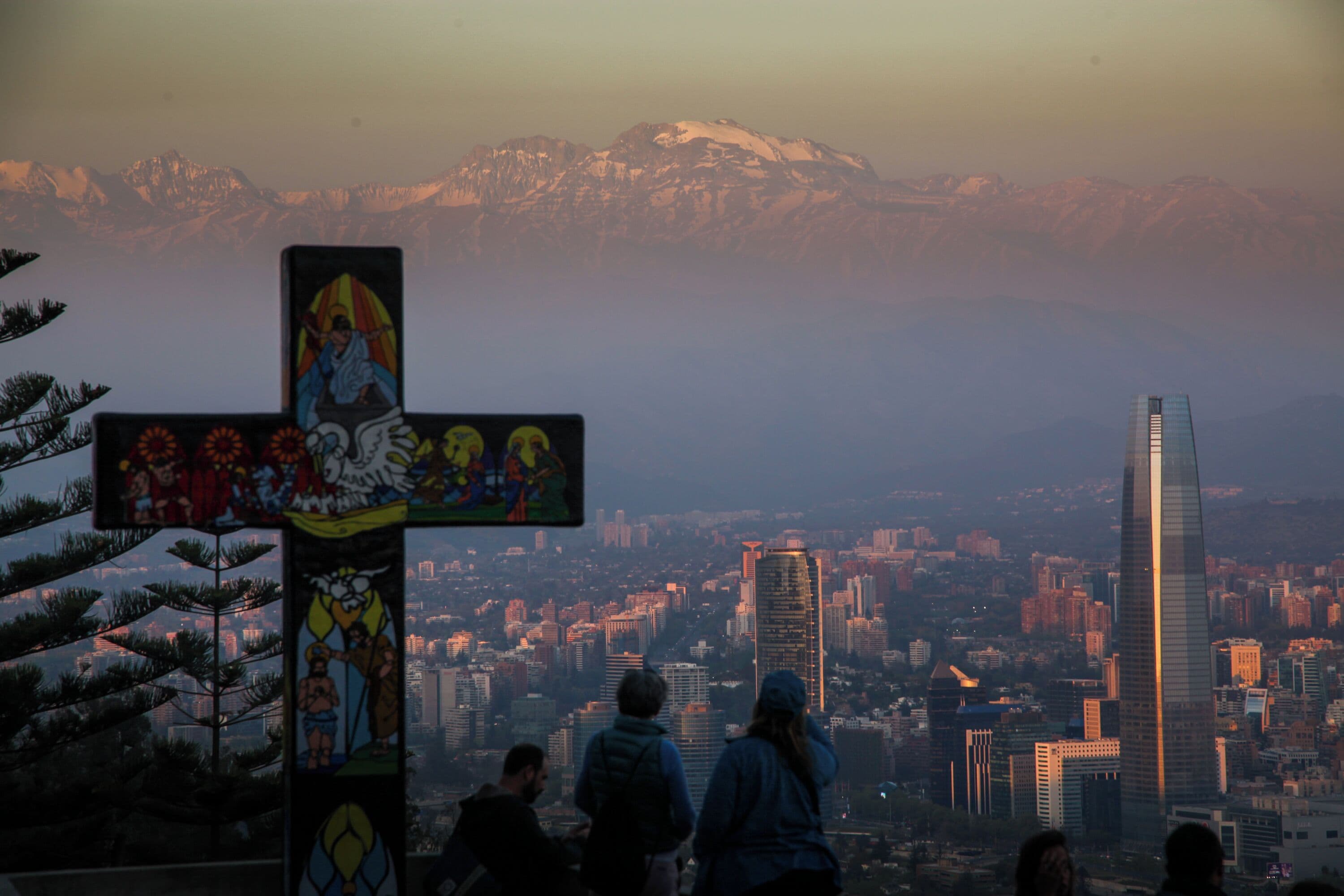 Take the cable car up San Cristóbal Hill at sunset. Santiago, Chile www.benhowe.net #southamerica #chile #cross #mountain #santigo #SanCristóbalHill