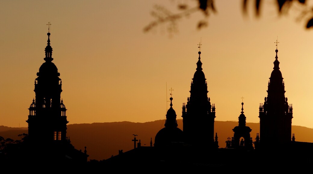 Santiago de Compostela showing religious aspects, a sunset and a church or cathedral