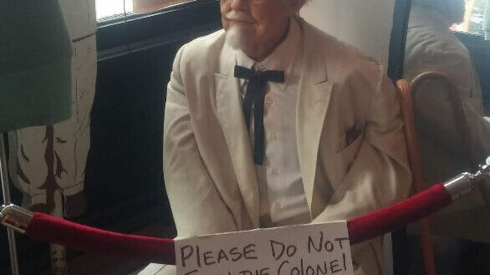 Colonel Harland David Sanders' wax doppelganger sporting an original white suit hanging out behind the velvet rope at WHY Lou Two.