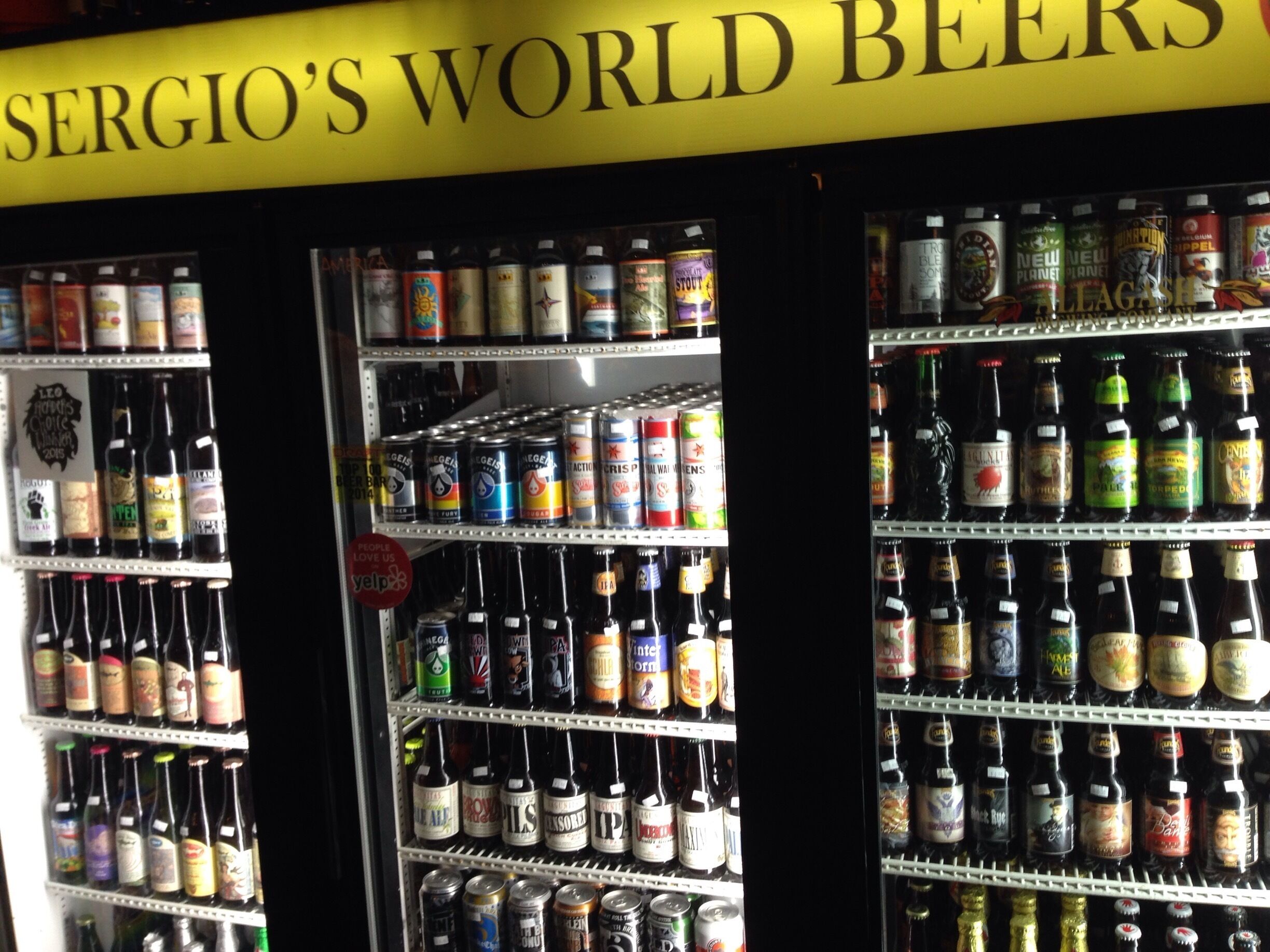 No photo will ever be able to accurately capture this place. From the outside, it looks like a sketchy liquor store. But you walk and are greeted by a bar with dozens of taps and stacks of glasses, and refrigerators of all sorts of beers lining the walls. Then you follow the hallway back and it opens into a seated dining area with heaps of more fridges!! And a final back hallway! Amazing!