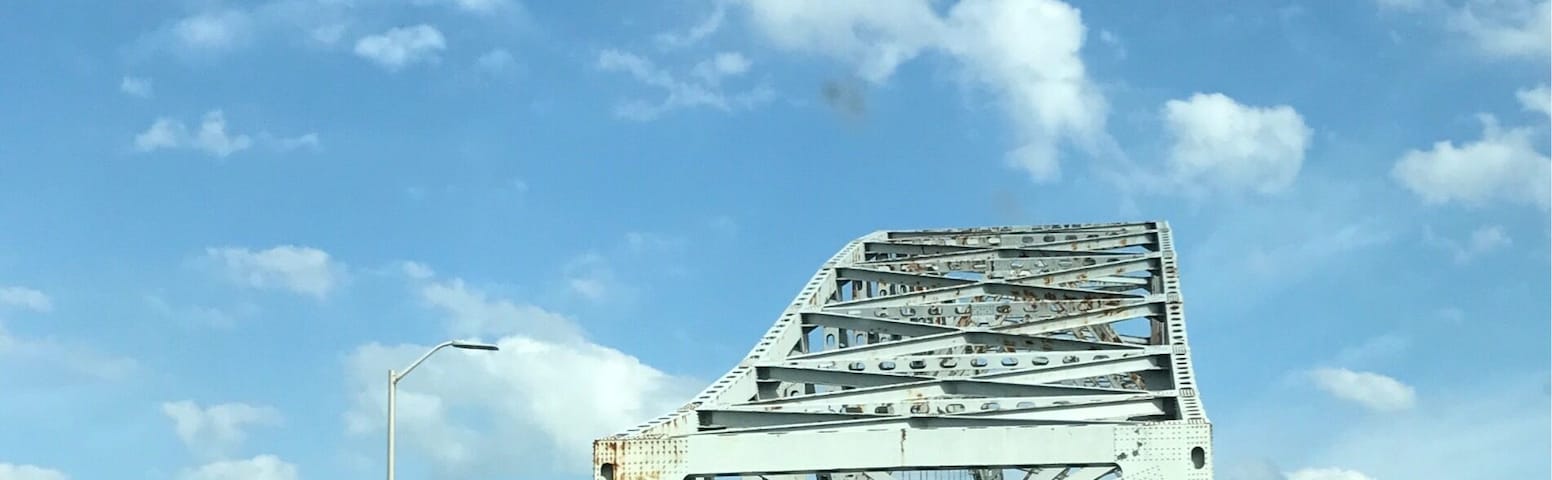 The Sherman Minton Bridge is a double-deck through arch bridge spanning the Ohio River, carrying I-64 and US 150 over the river between Kentucky and Indiana. The bridge connects the west side of Louisville, Kentucky to downtown New Albany, Indiana.