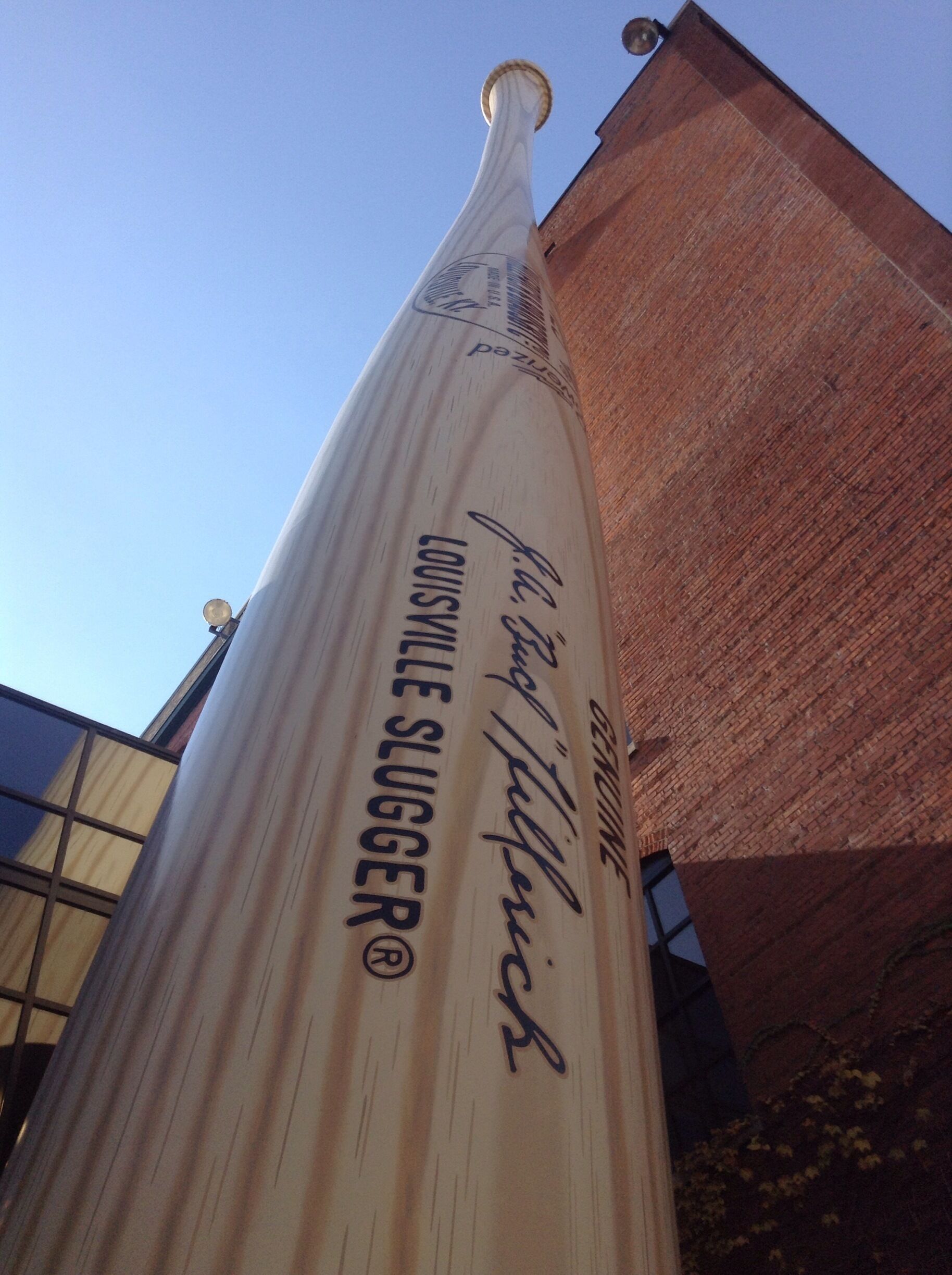 At the Louisville Slugger Museum, this bat towers over the museum and most of the surrounding trees. You can stand under it and it will appear as if it is about to fall top of you. 