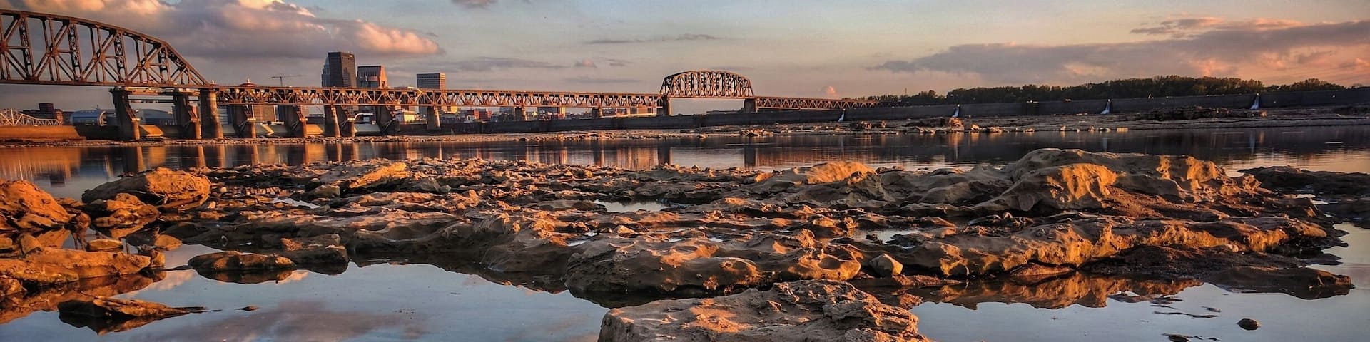 View of Louisville from the Falls of the Ohio at Golden Hour. #BVSblue