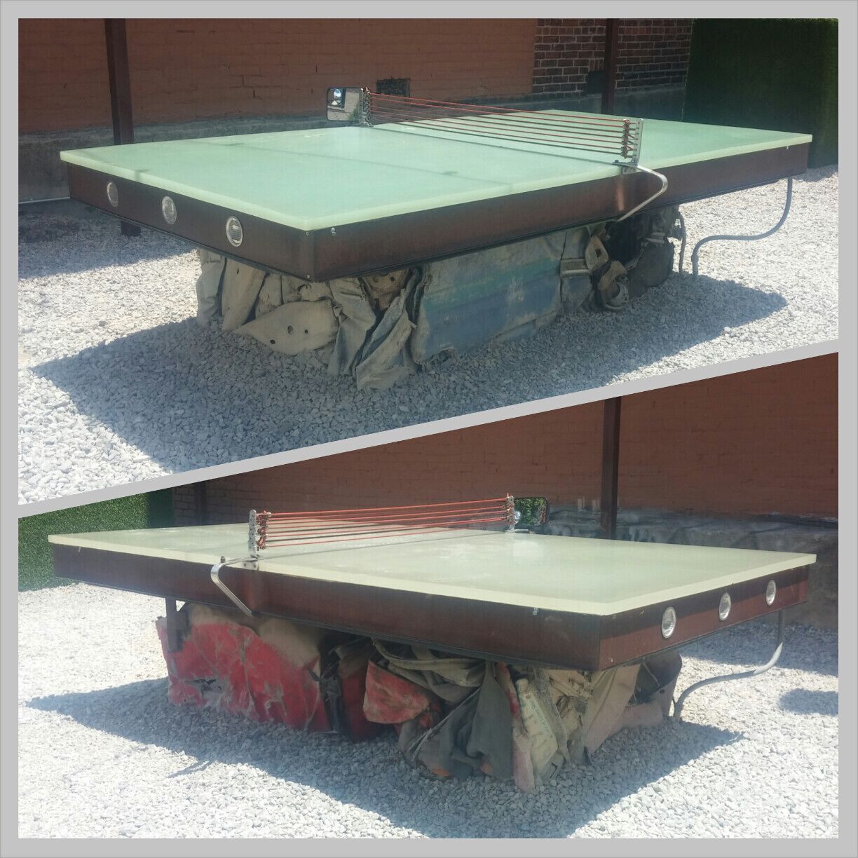 A pair of industrial strength ping pong tables with bases made from compacted cars!