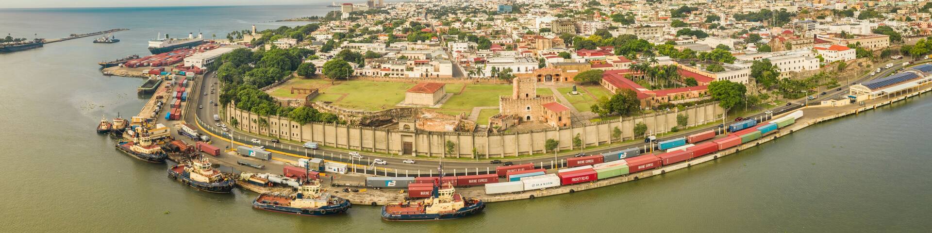 Santo Domingo, Dominican Republic - 16 December 2020: Aerial view of Santo Domingo cityscape with Ozama Fort facing the Ozama river, Zona Colonial.