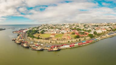 Santo Domingo, Dominican Republic - 16 December 2020: Aerial view of Santo Domingo cityscape with Ozama Fort facing the Ozama river, Zona Colonial.