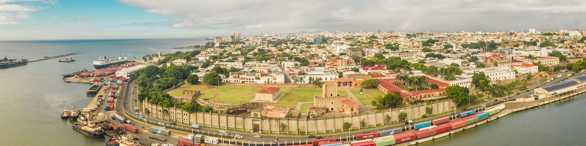 Santo Domingo, Dominican Republic - 16 December 2020: Aerial view of Santo Domingo cityscape with Ozama Fort facing the Ozama river, Zona Colonial.