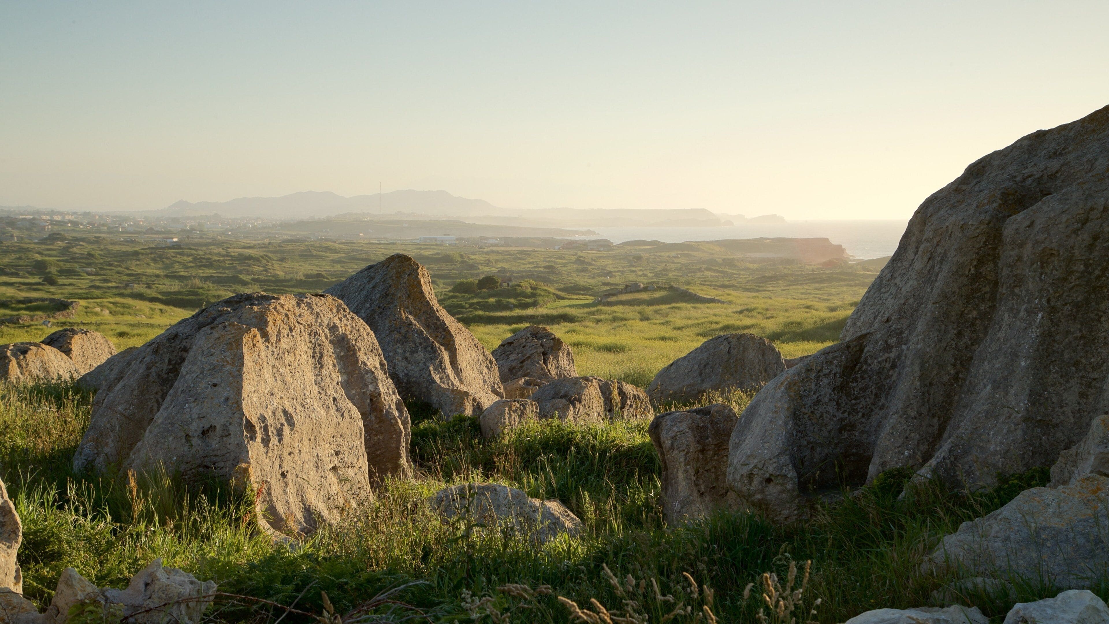 Santander showing a sunset and tranquil scenes