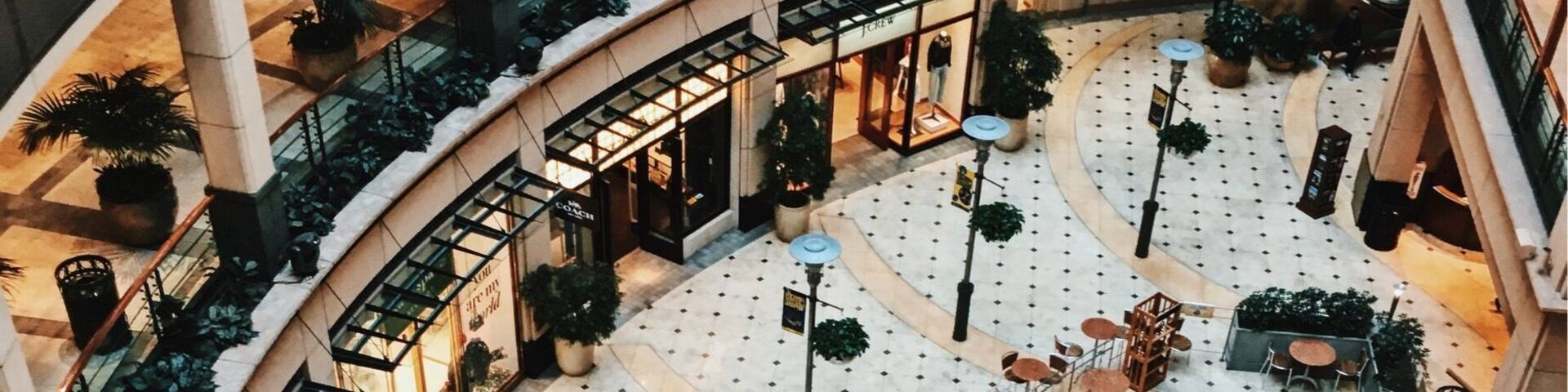 A nice multi-level mall in the middle of the city.