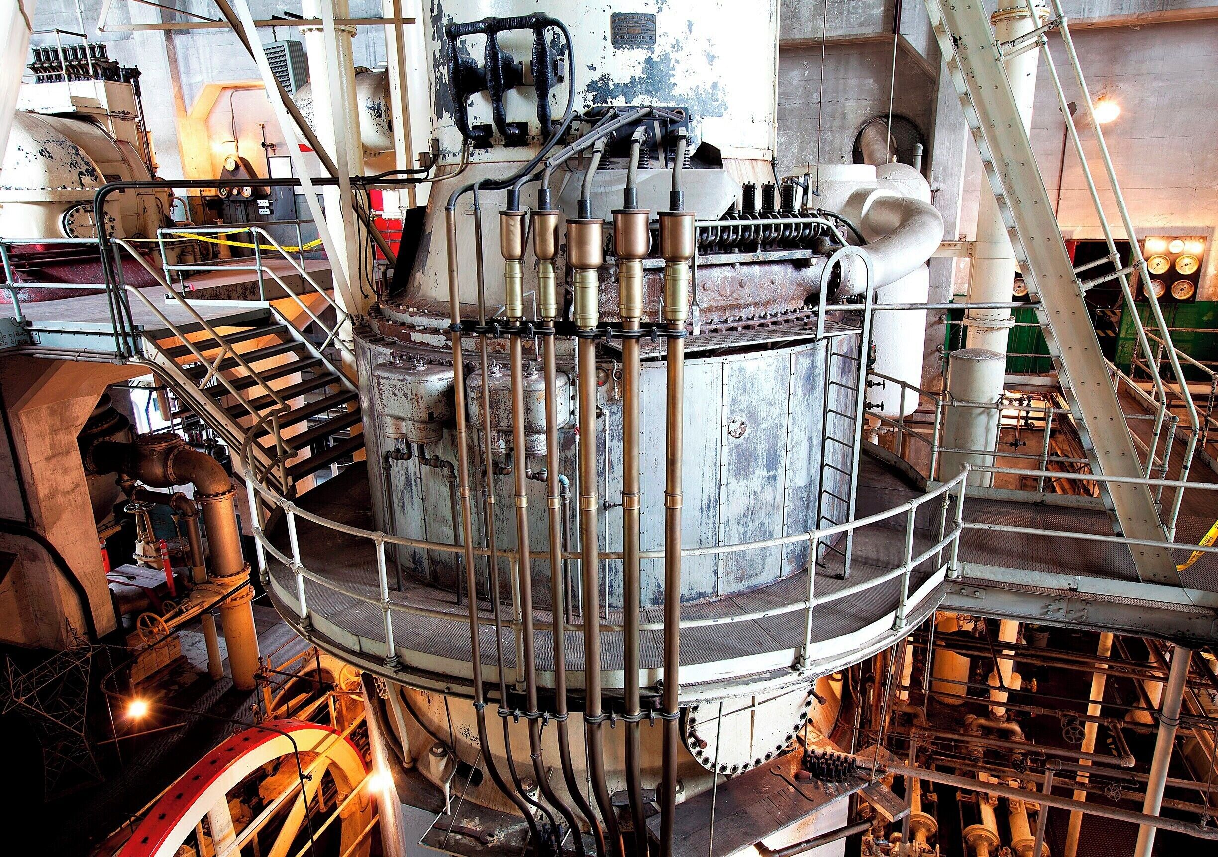This 1907 Curtis Steam Turbine is one of only a handful still remaining from the early days of electrical power generation.  Turbine design was at the forefront of technology in the early 1900s, and this particular turbine is a wonderful example, as it generated nearly 3 times the power of an adjacent turbine installed just one year earlier.  Later, in 1917, a much smaller third turbine was added, which itself generated nearly as much power as the first two turbines combined.  Such is the relentless pace of technology, and why so few of these historical turbines remain.

The Georgetown Steam Plant was built in 1906 to provide power for Seattle's streetcars, the city of Georgetown, and the Seattle-Tacoma Railway.  Although the turbines were state-of-the art for their time, the technology was advancing so quickly that the plant became outdated within 10 years. It was soon relegated to secondary status and was used occasionally through the 1970s during droughts and to meet peak power demand.

Today, the nearly-complete plant is operated as a free museum and is open to the public the second Saturday of every month from 10am-2pm.
