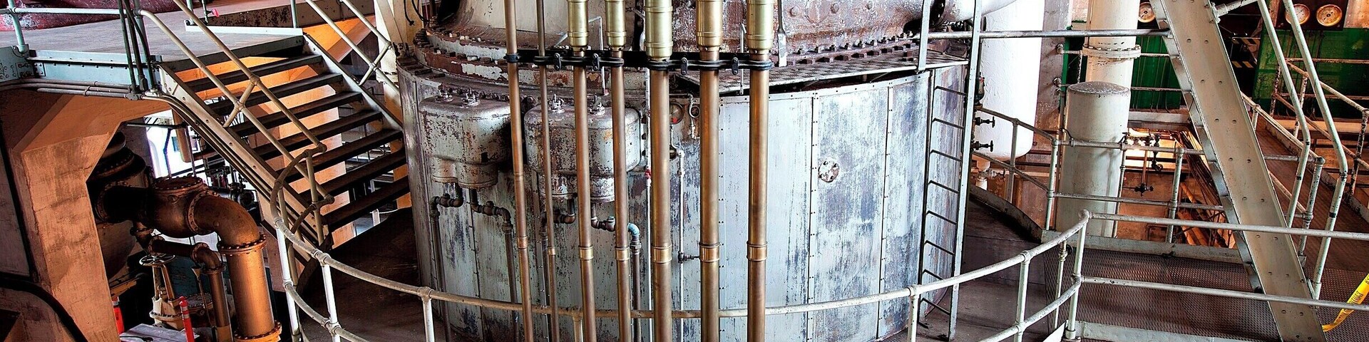 This 1907 Curtis Steam Turbine is one of only a handful still remaining from the early days of electrical power generation. Turbine design was at the forefront of technology in the early 1900s, and this particular turbine is a wonderful example, as it generated nearly 3 times the power of an adjacent turbine installed just one year earlier. Later, in 1917, a much smaller third turbine was added, which itself generated nearly as much power as the first two turbines combined. Such is the relentless pace of technology, and why so few of these historical turbines remain.
The Georgetown Steam Plant was built in 1906 to provide power for Seattle's streetcars, the city of Georgetown, and the Seattle-Tacoma Railway. Although the turbines were state-of-the art for their time, the technology was advancing so quickly that the plant became outdated within 10 years. It was soon relegated to secondary status and was used occasionally through the 1970s during droughts and to meet peak power demand.
Today, the nearly-complete plant is operated as a free museum and is open to the public the second Saturday of every month from 10am-2pm.