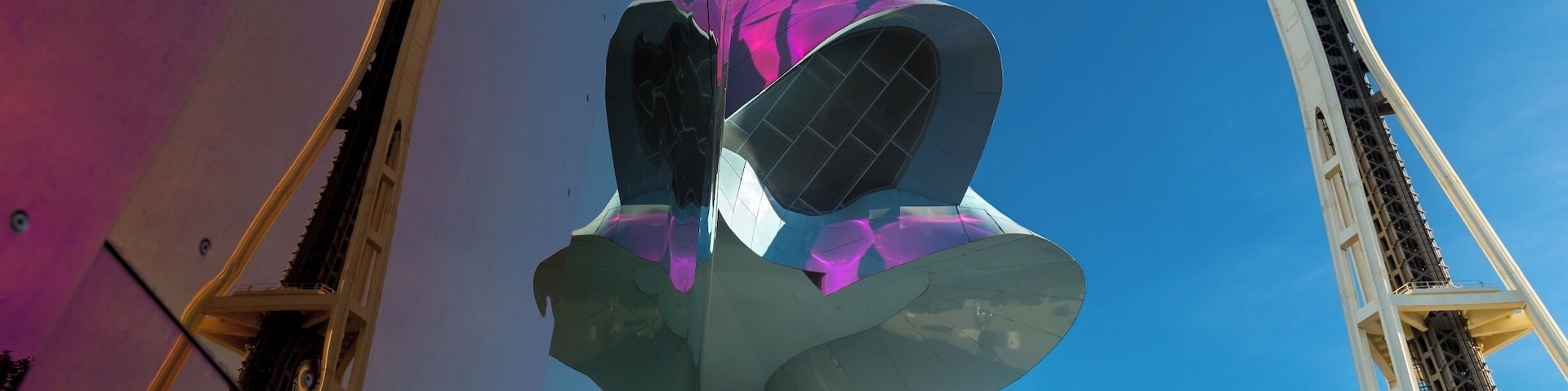 Seattle's iconic Space Needle and Monorail reflected in the Museum of Pop Culture at the Seattle Centre. I absolutely love Seattle.... it has such a fantastic vibe and I love this funky reflection shot! #reflections