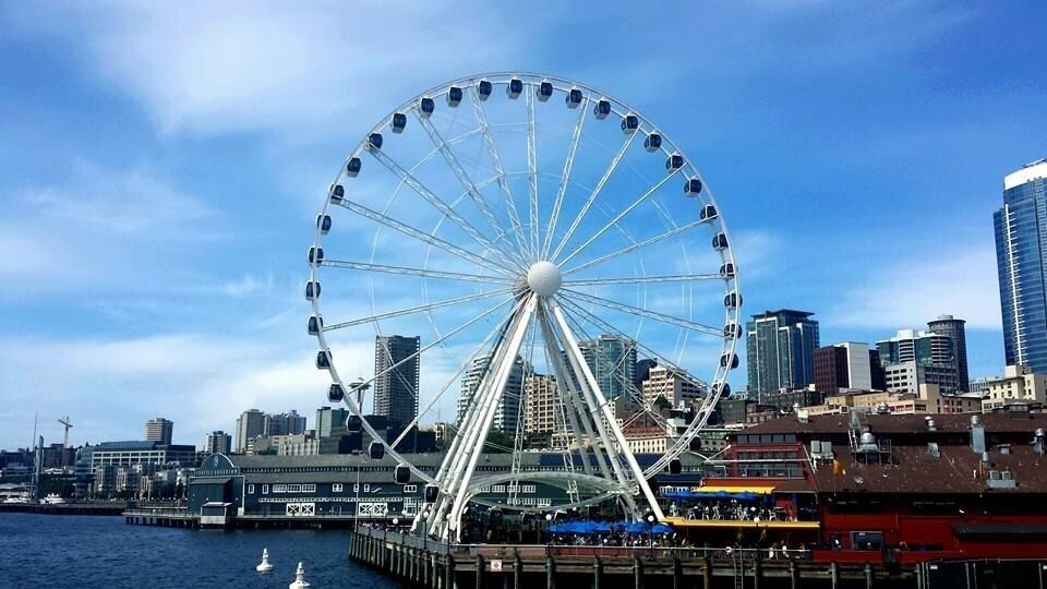 The Seattle Great Wheel is a giant Ferris wheel at Pier 57 on Elliott Bay in Seattle, Washington. With an overall height of 175 feet (53.3 m), it was the tallest Ferris wheel on the West Coast of the United States when it opened on June 29, 2012, costing $20 million. 

Approximately 200 people lined up for the first ride on the wheel. Tickets cost $13 per person, with discounts for children and seniors. One luxury VIP gondola with red leather seats and a glass floor is available and costs $50 per person.
#blue #travel