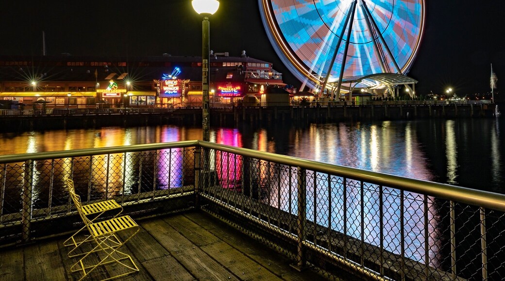 I must credit @AnneArchambault for this post. She was the one originally that had the eye for this shot. When I saw it, I couldnât help but try to recreate it for myself, with my own interpretation. I believe I took this shot a little further out than Anne did (as I took it from the second corner of the pier, instead of the first. I just love the colors that reflect off of the water here.
It does appear that there have been some changes to the pier since Anne shot her photo. I noticed that the âWings Over Washington must be fairly new as it wasnât in her shot as well as the chairs seem to have changed. I actually prefer the chairs in her shot to mine, but these metal ones had to do for mine. I also notice that the colors of the Ferris Wheel on the night Anne shot her photo had greens and yellows where mine was just blue and pink. I do like the colors of the Ferris Wheel on Anne's photo better
Overall, great place to visit. My wife and I got in line for the Ferris Wheel and the views are fantastic. If you happen to be in Seattle, you should definitely check this out!
#Seattle #GreatWheel #FerrisWheel #Pier #Pier57 #colorful #Night #reflection #water