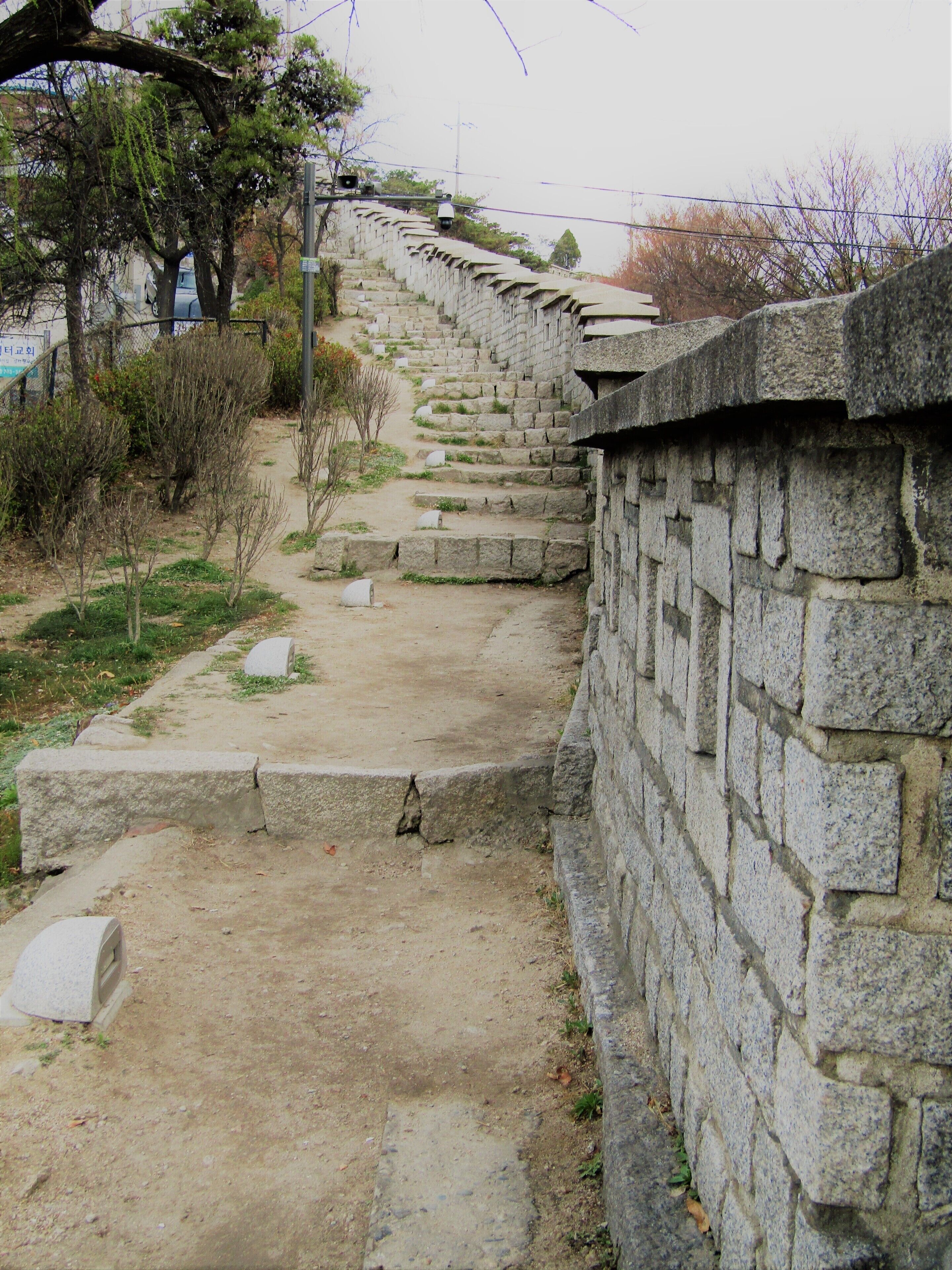 Directly behind the Seoul City Wall Museum, you'll find this trail which runs along the old city wall. It is quite peaceful and quaint, even though it's surrounded by one of the largest cities in the world. The views backwards of the city are amazing, and more wonderful views await you as you reach the top.