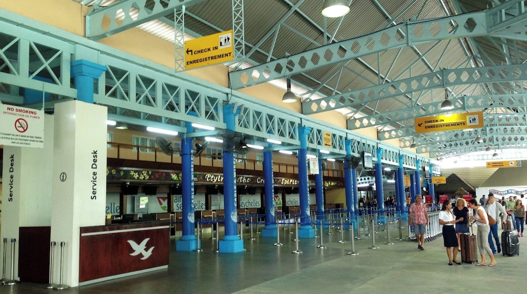Small international airport - the check-in area is completely with out any walls or doors to the street.