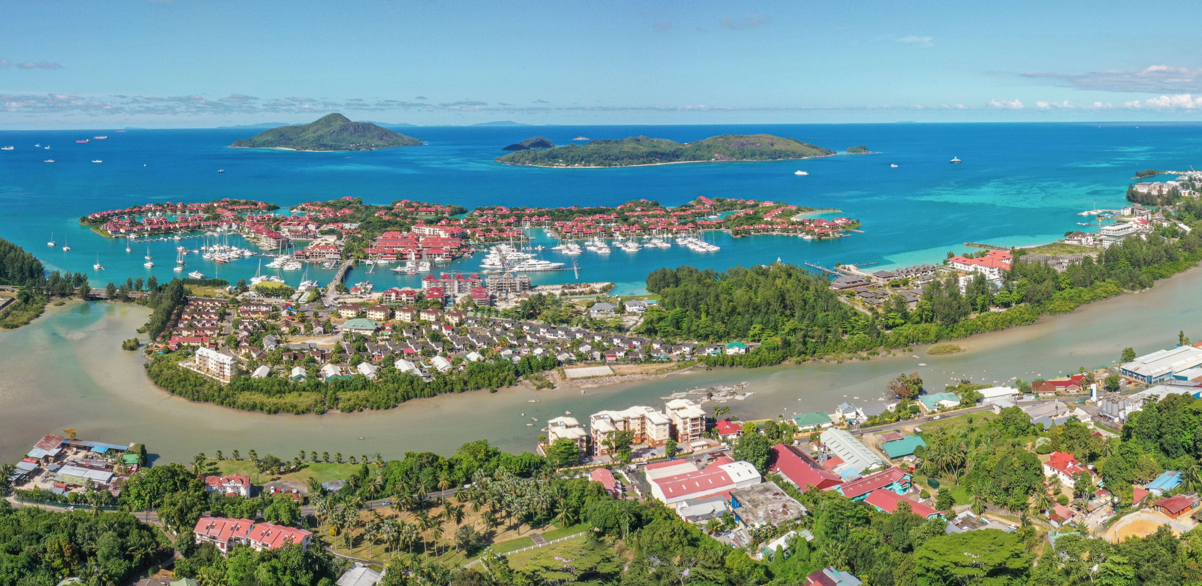 Panoramic aerial view of Victoria, Eden Island and the St. Anne Marine National Park on the East coast of Mahé, Seychelles.