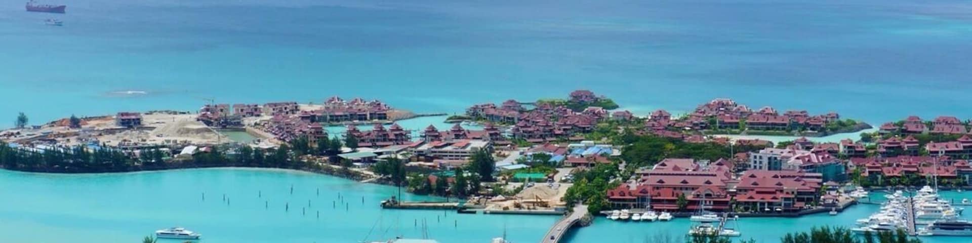 man made island with houses/ apartments for sale. it seems that if you buy a house or apt you automatically get the citizenship