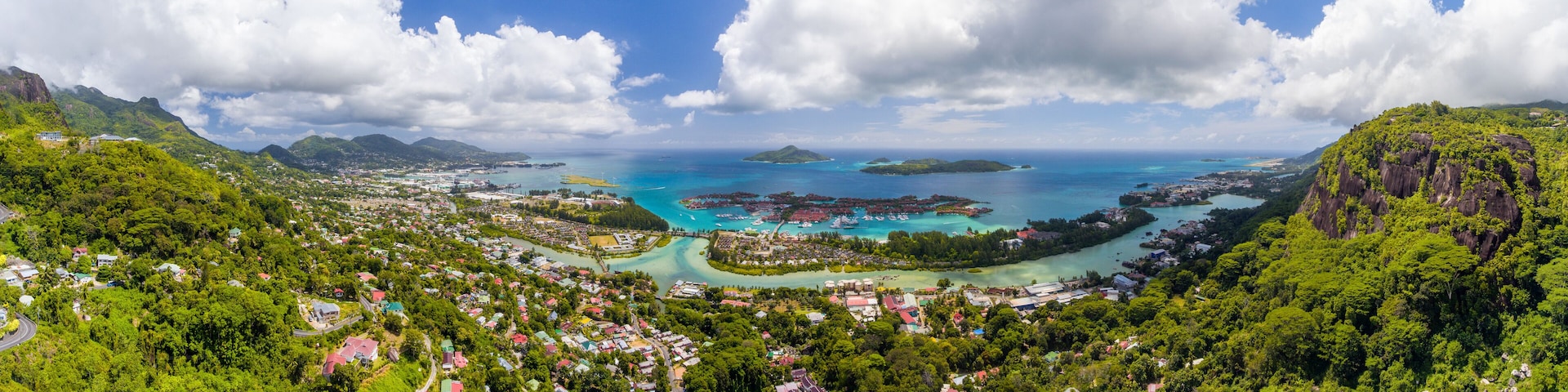 Aerial sunset panoramic view of Mahe coastline and Eden Island, Seychelles