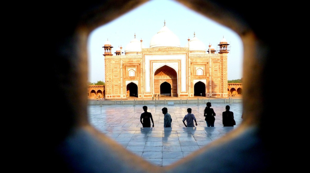 Shot of the mosque and tourists as seen from inside the mausoleum. Words will never do the Taj Mahal justice. Agra however has a lot to be desired. Come here for a day only because there's nothing to do in Agra. You could see Taj Mahal and Red Fort and be set.