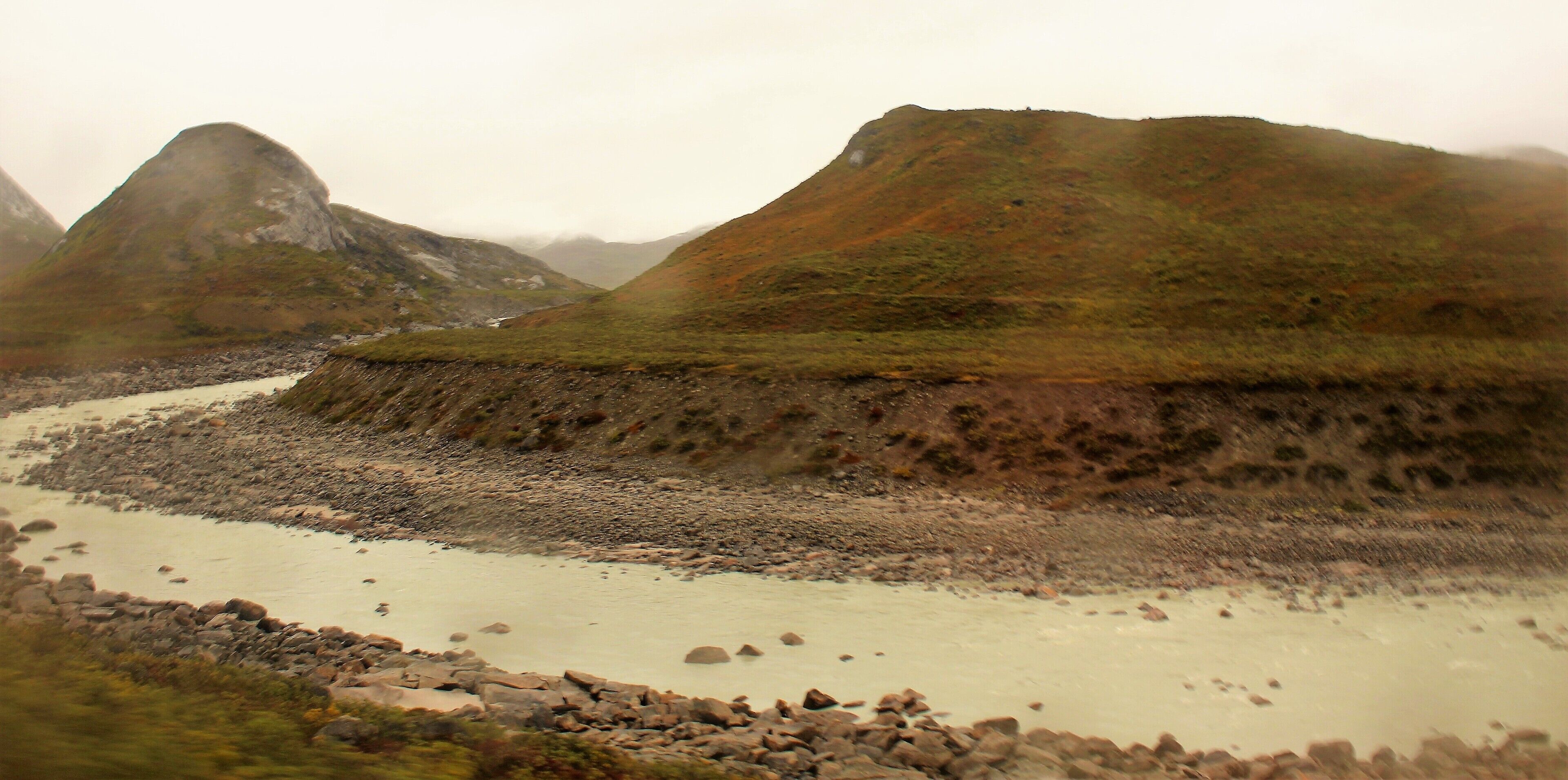 Sugar Loaf Mountain above the Arctic Circle, near Kangerlussuaq! I had a great tour that day featuring ice caps and the autumnal countryside! This was taken from the bus on the way back to town. Anyone going to Greenland will probably fly into Kangerlussuaq, the main international airport hub (even if only about 500 people live there!).. If you do I highly recommend the Point 660 Tour (with Albatros Arctic Circle). There are many other cool tours to choose from, too! I took this photo on August 30th (where it was already very much autumn!). 