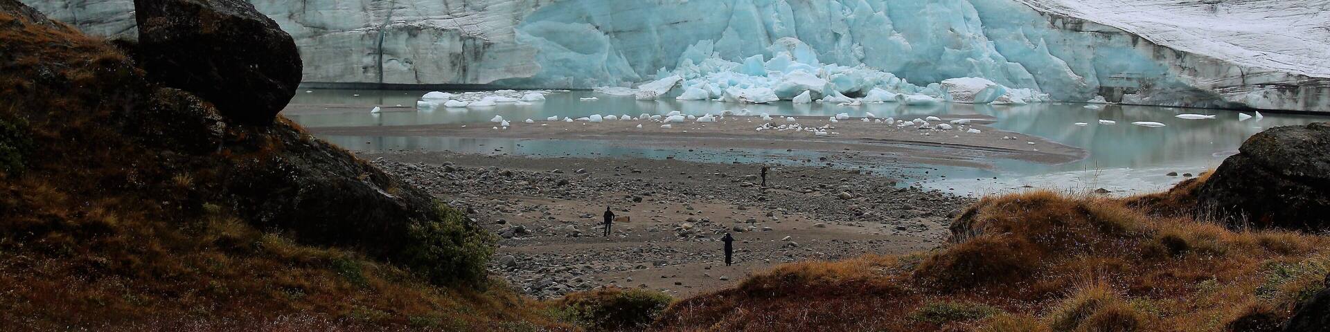 At the Greenland Ice Sheet, around 50 km/31 mi north of the Arctic Circle! Hard to believe it was almost 1 year ago. West Greenland is absolutely beautiful and had a memorable few days there! After my trip to the Faroe Islands (and 1 day in Copenhagen) I visited Greenland. Which was a real dream come true :). I actually changed my plans only a couple weeks before I left for my trip. I originally was suppose to only go to the Faroes and Copenhagen. But decided to go to Greenland when I saw the cheaper flights ;). I took this photo near Kangerlussuaq, which is Greenland's main air transport hub. I spent 1 night there before heading to Nuuk (the capital of Greenland). Had a great day trip that day, too! In fact it may have been my favorite day of the whole trip! The landscape was diverse, with colorful hills and mountains and valleys but also white & blue ice! I did return to Kangerlussuaq at the end of my trip and had another excursion, too. Shorter and closer to the airport but breathtaking, as well. And despite a lot of people being seen in this photo this is a quite isolated place, obviously. There is a road nearby, built by either wartime Americans or post-war Germans. It's I think the longest road in all of Greenland. But make no mistake - it is quite a rural and lightly traveled road! Not many people have ventured on it. It was surreal to be so away from civilization. And to be so far north in the world :).
Note: The map location is only the *approximate* location. It could be here or it could be a few KM away.