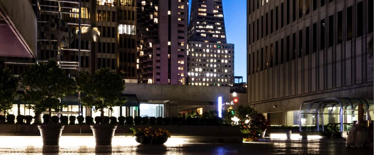 This spot is located on top of 2 Embarcadero Center right next to the Fitness SF. During the day there is a lot of foot traffic so you will likely have people in your shot. The evening is much less crowded and a more ideal time to shoot because of the lights. This shot was on a Friday night, but if you can go Monday - Thursday you will likely get more lights on in the buildings because some people will be working late. You will also notice the unique flooring here. This patter is throughout all the embarcadero centers. It really reminds me of the beach front walking paths of Impanema and Copacobana in Rio de Janero.