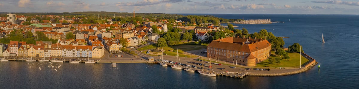 Panoramic aerial view of of the harbor and castle in Sonderborg Jutland, Denmark, Europe. Panorama view of old town and colorful old houses in the harbor of Sonderborg.
