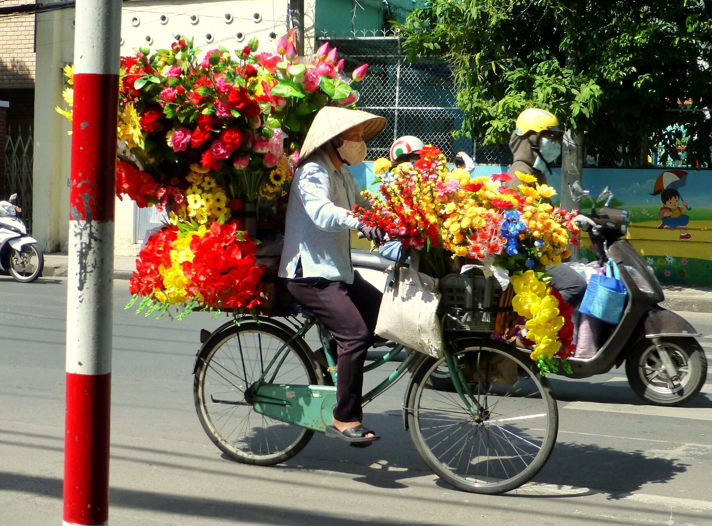 I love all the things they carry on bikes and scooters in Vietnam. I could sit and observe for hours!