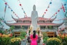 Temple Views | Vĩnh Nghiêm Pagoda: Wearing a beautiful pink áo dài a Vietnamese women stands in front of a statue praying, well looking like she’s praying, I asked her to pose for me and I’m great fully appreciative. Vĩnh Nghiêm Pagoda is one of the largest pagodas in Hồ Chí Minh, built in 1971 it is a relatively young pagoda. The pagoda incorporates a touch of Japanese architectural style in addition to Vietnamese traditional design and is also the first traditionally inspired pagoda in Vietnam built with concrete.
.
.
.
.
#sonyalpha #sonya7riii #traveler #travellife #travelphotography #travelpics #travelgram #wanderer #wanderlust #instagood #instatravel #yourshotphotographer #lpfanphoto #travelsoutheastasia #explorevietnam #southeastasia #vietnam #saigon #hochiminh #visitvietnam #beautifulseasia #igvietnam #vietnamcharm #vscovietnam #buddhism #praying #aodai #pagoda #temple #statue