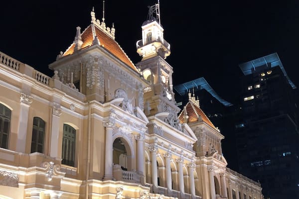 The City Hall in Ho Chi Minh lit up at night.