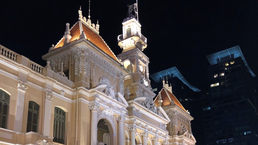 The City Hall in Ho Chi Minh lit up at night.