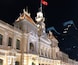 The City Hall in Ho Chi Minh lit up at night.