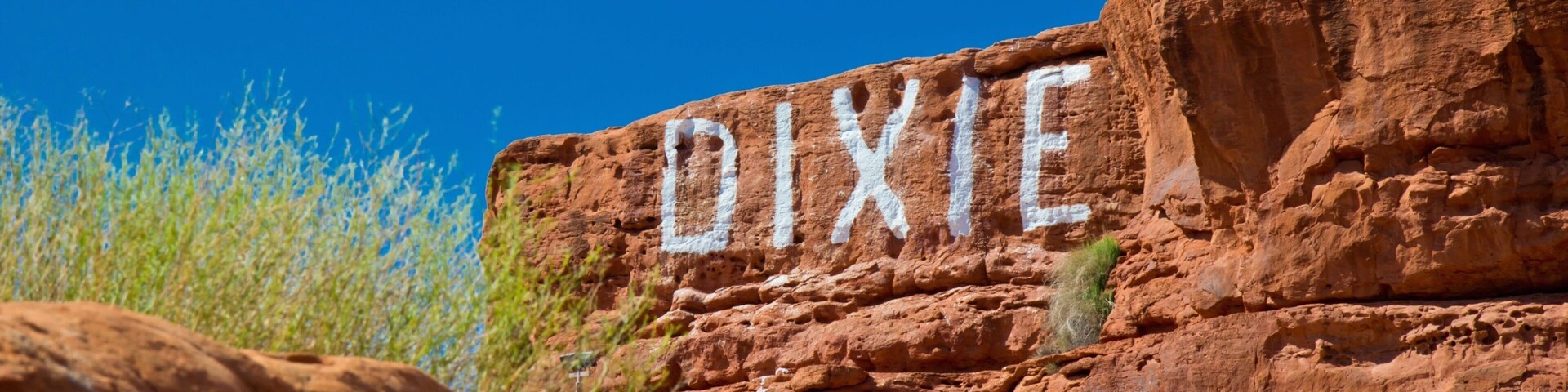 St. George showing signage and a gorge or canyon