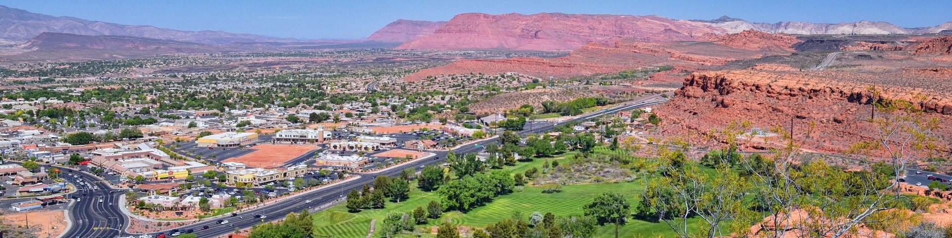 Saint George hiking trail Owen’s Loop via Brooks Nature Trail views of sandstone mountains and desert plants around the Red Cliffs National Conservation Areas in southwest Utah, by Zion’s National Par