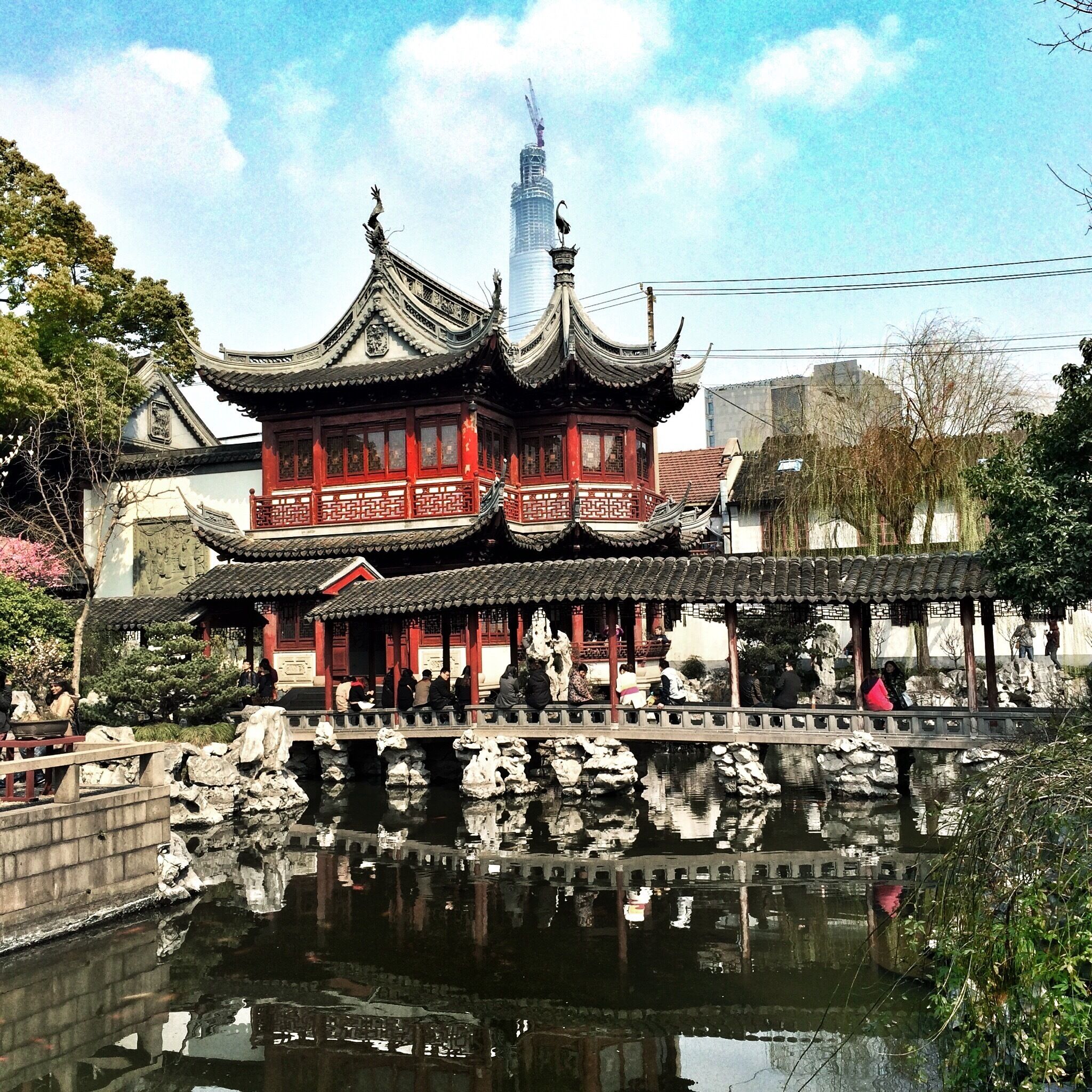 If You're in Shanghai and you only a few days, Yuyuan Garden is a good spot to experience the art of Chinese gardens. 
This spot shows the contrast between old and new China with the Shanghai tower in the back.
#architecture #shanghai #china