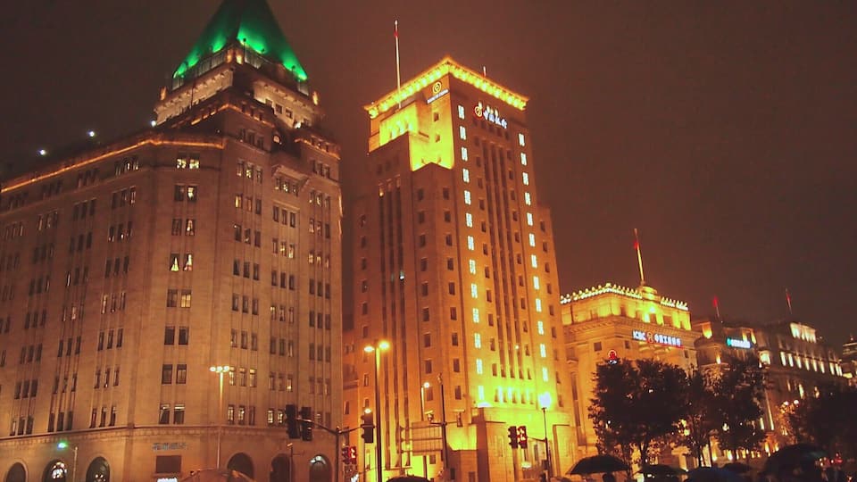 The Bund is a waterside walkway that faces, on the other side of the Huangpu River, the iconic skyscapes of Pudong district