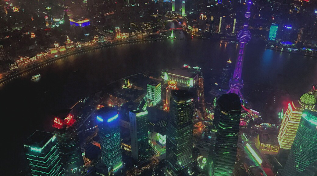 Twisting high above Shanghai's financial district, China's tallest tower â and the second tallest in the world as of writing â is over two thousand feet high with 128 floors. Go to the observation deck for the best views of Shanghai's electric skyline. #AboveItAll