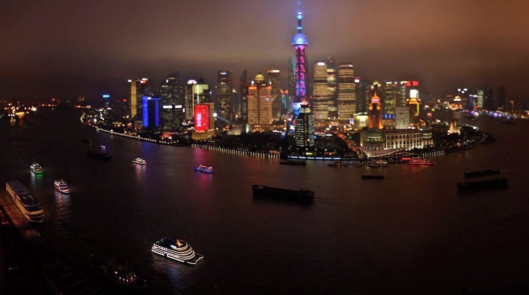 A great spot to see the city at night. Don't be afraid to head on up to the top. The Bar will charge you an entrance fee, but it just goes towards a drink. Definitely the best place to see the contrast that is Shanghai